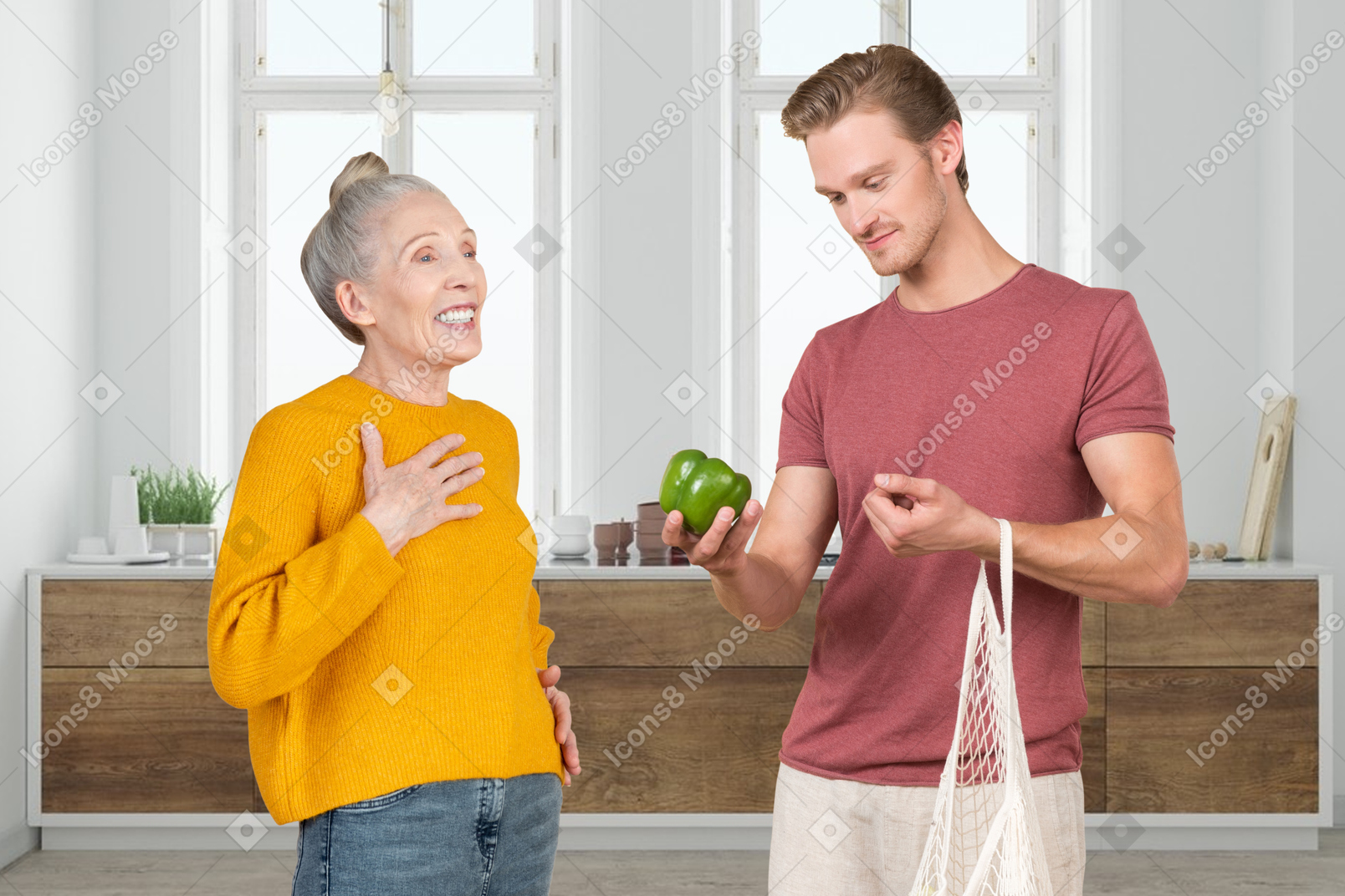 A man holding a green apple next to a woman