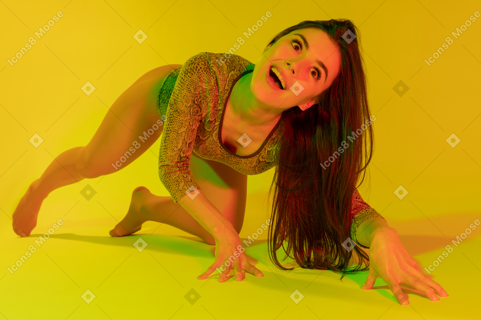 Cheerful female standing on all fours