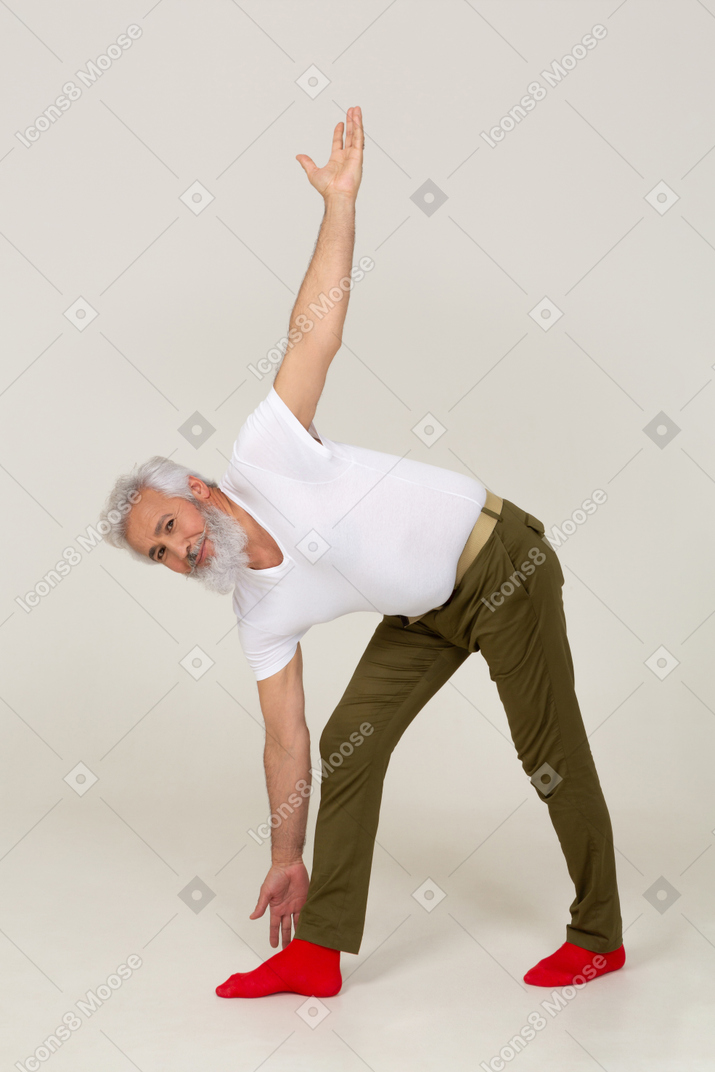 Front view of a man doing bending exercises