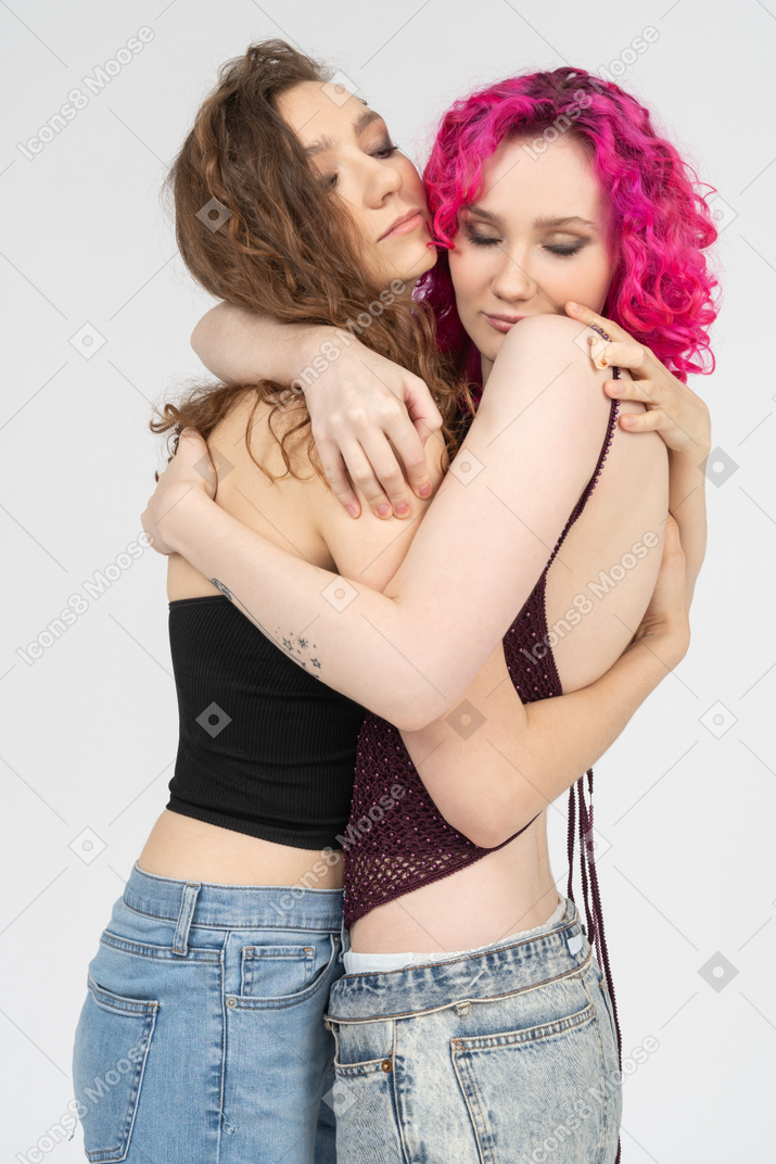 Sisters embracing