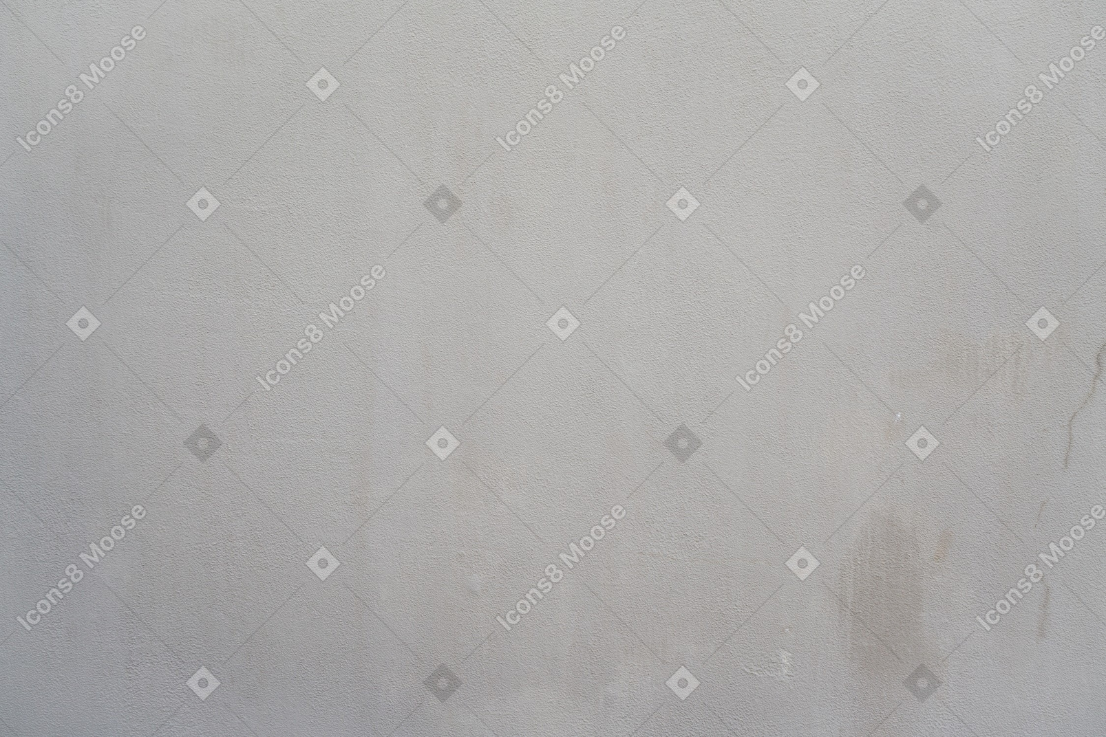 A light grey wall with a white border