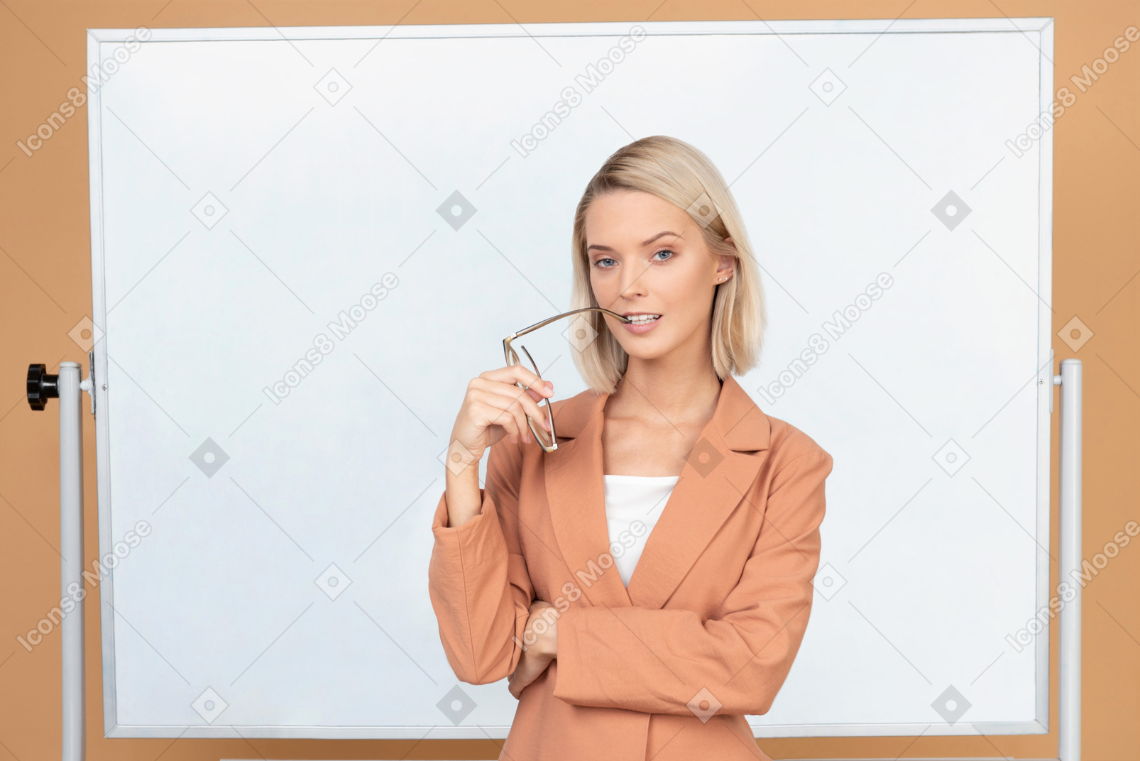Beautiful young teacher bitting her eyeglasses like thinking about something