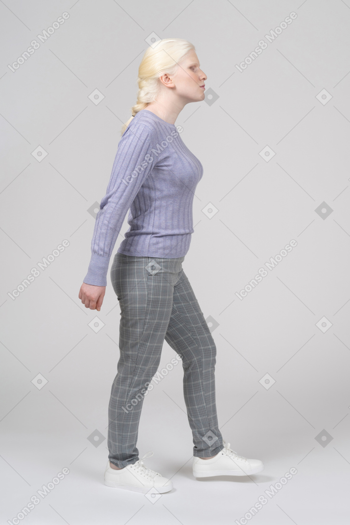 Woman walking right