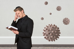 Man praying to escape coronavirus