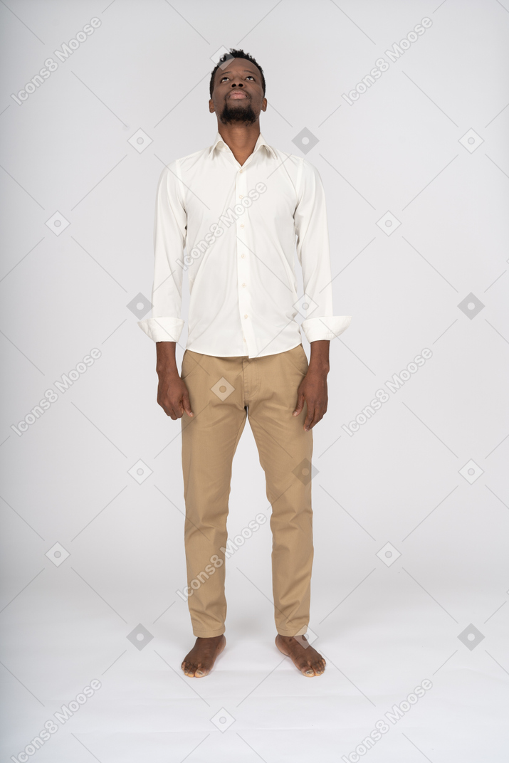 Man in white shirt standing