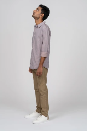 Young man in casual clothes standing