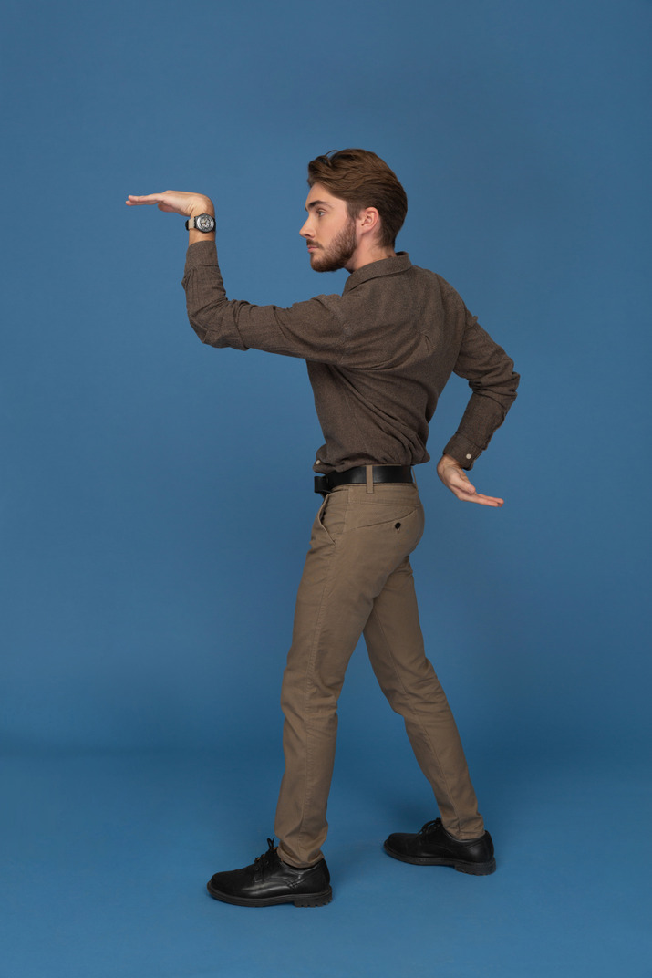 Slim young man showing egyptian poses