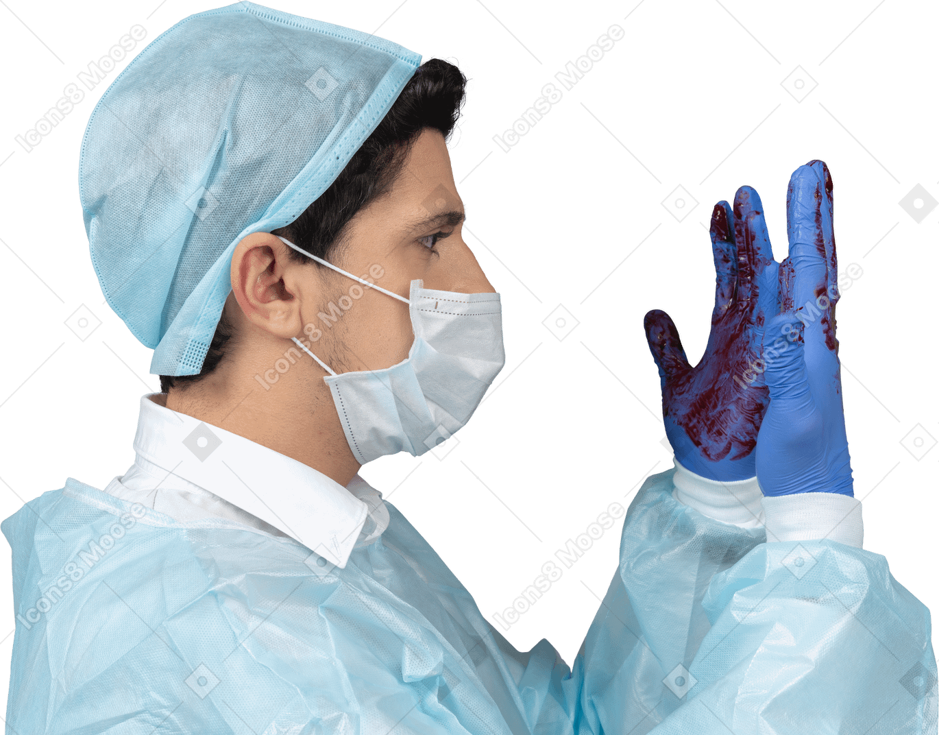 Doctor looking at his hands covered in blood in profile