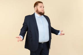 Young overweight office employee trying to understand something