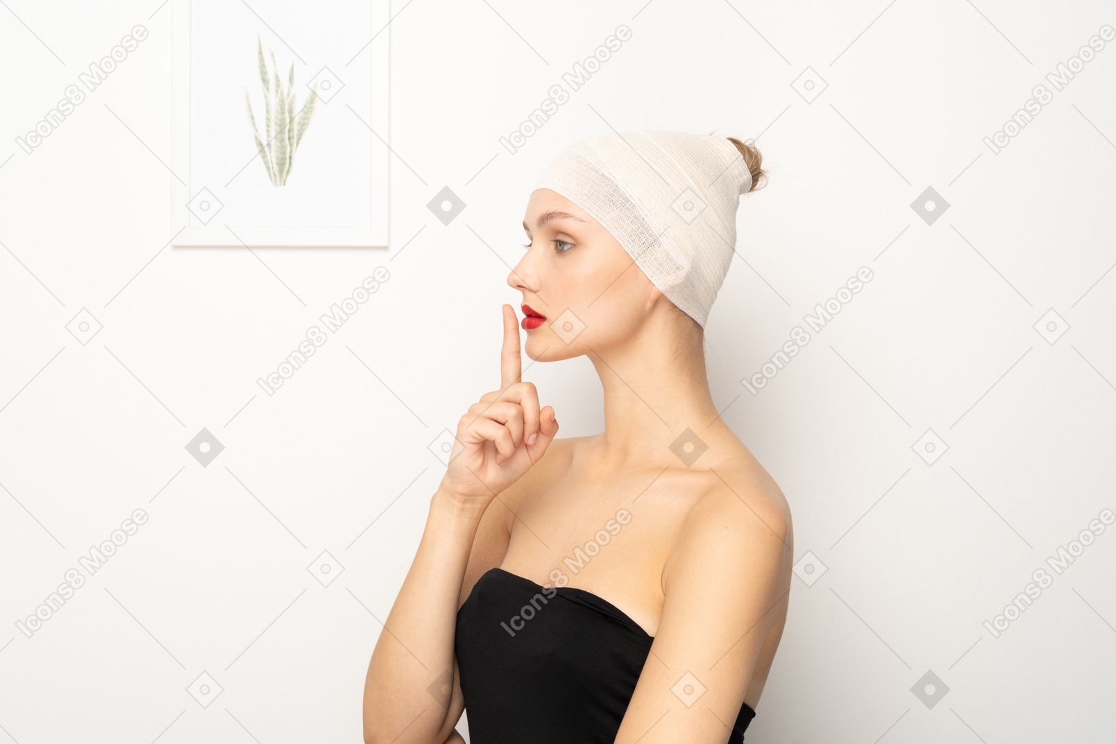 Young woman making silence gesture