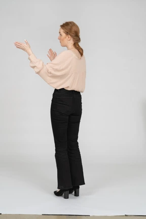 Woman in beautiful blouse jumping