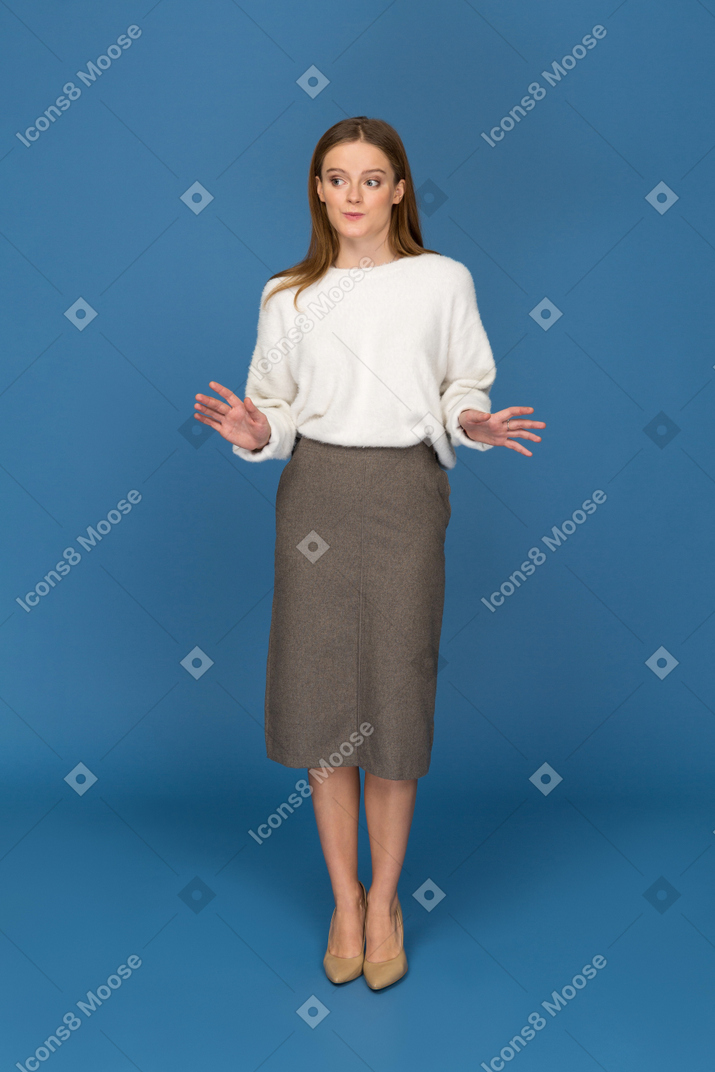 Young businesswoman expressing innocence