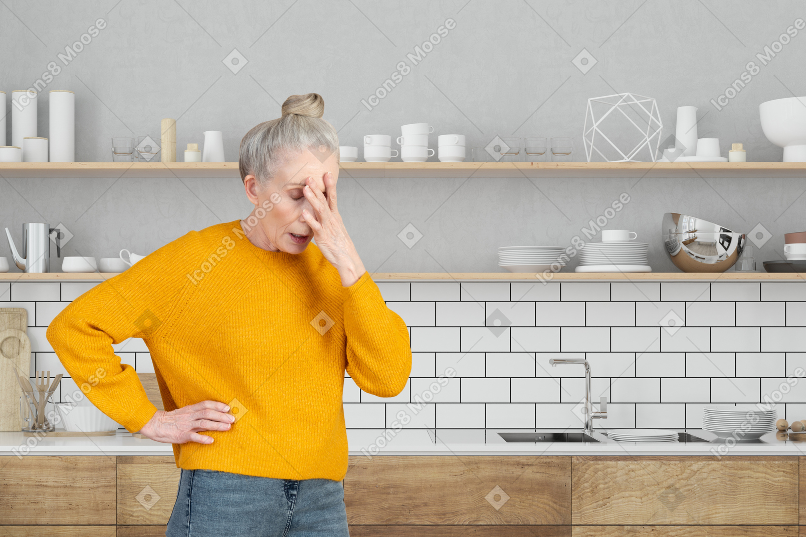 A woman standing in a kitchen holding her head