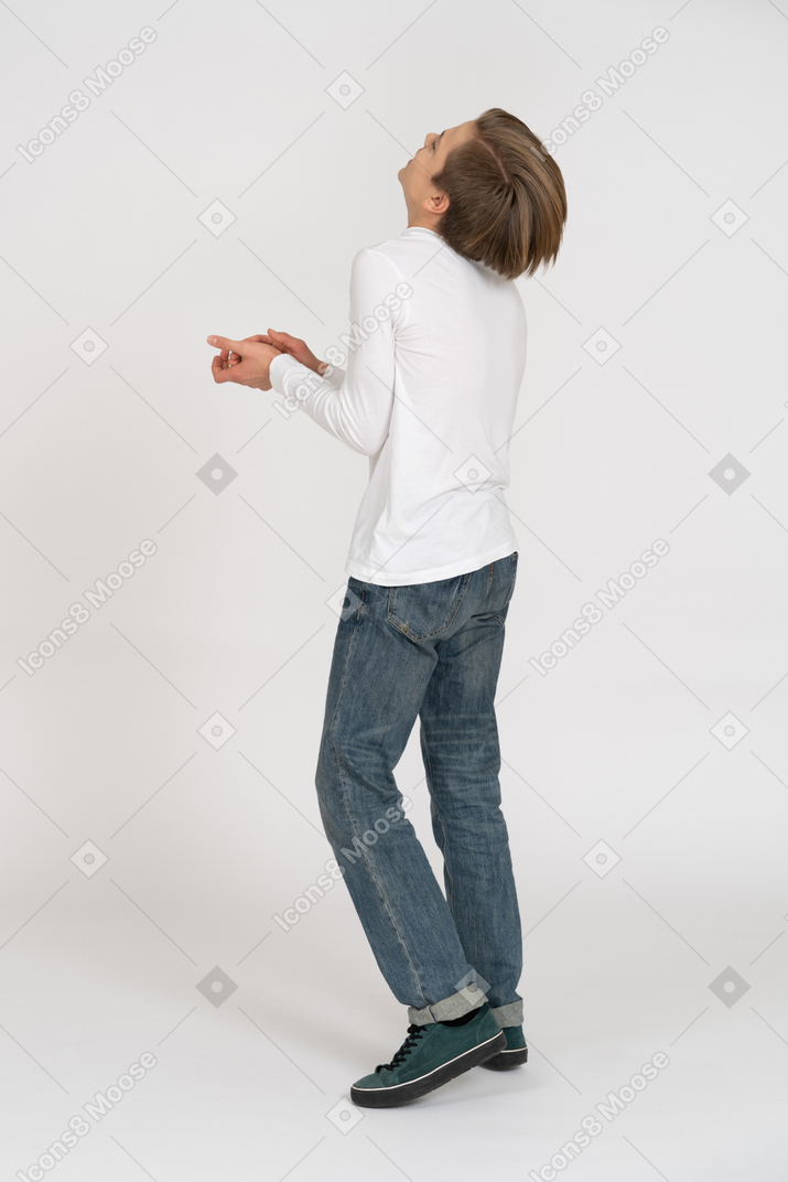 Young man in casual clothes standing