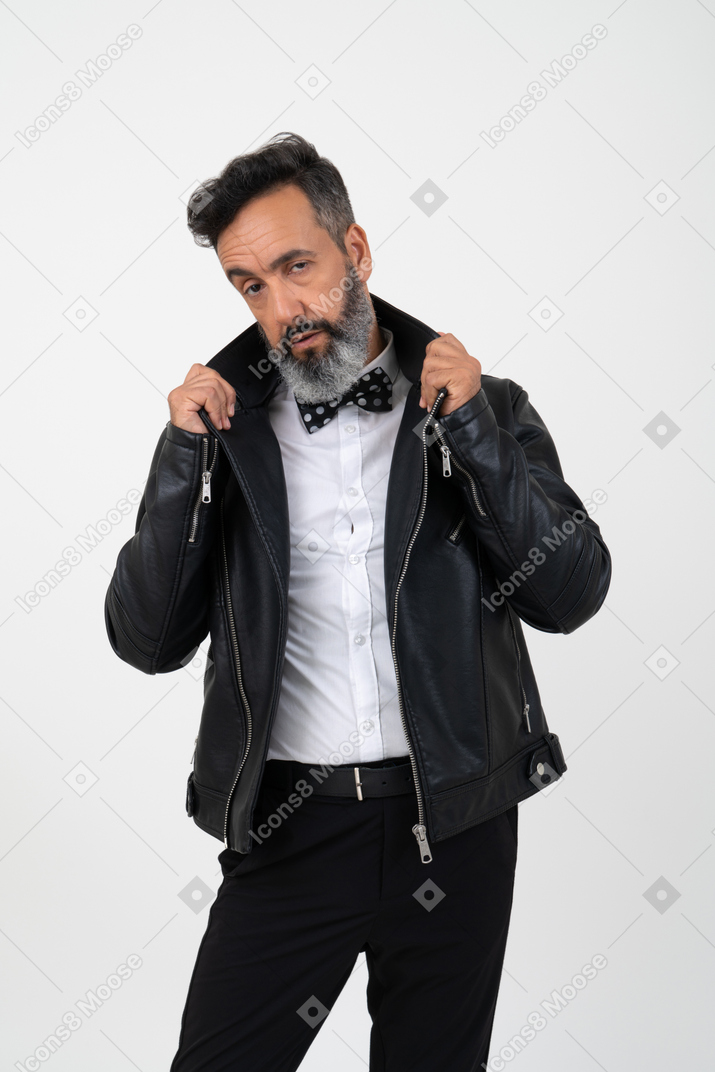 Curious mature man in leather jacket