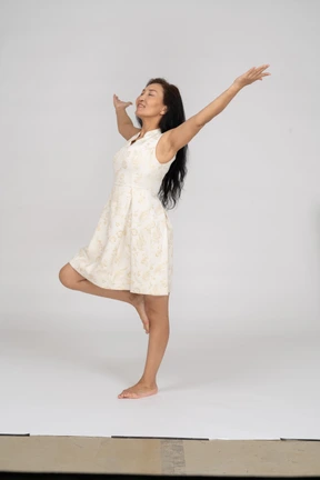 Woman in beautiful dress standing