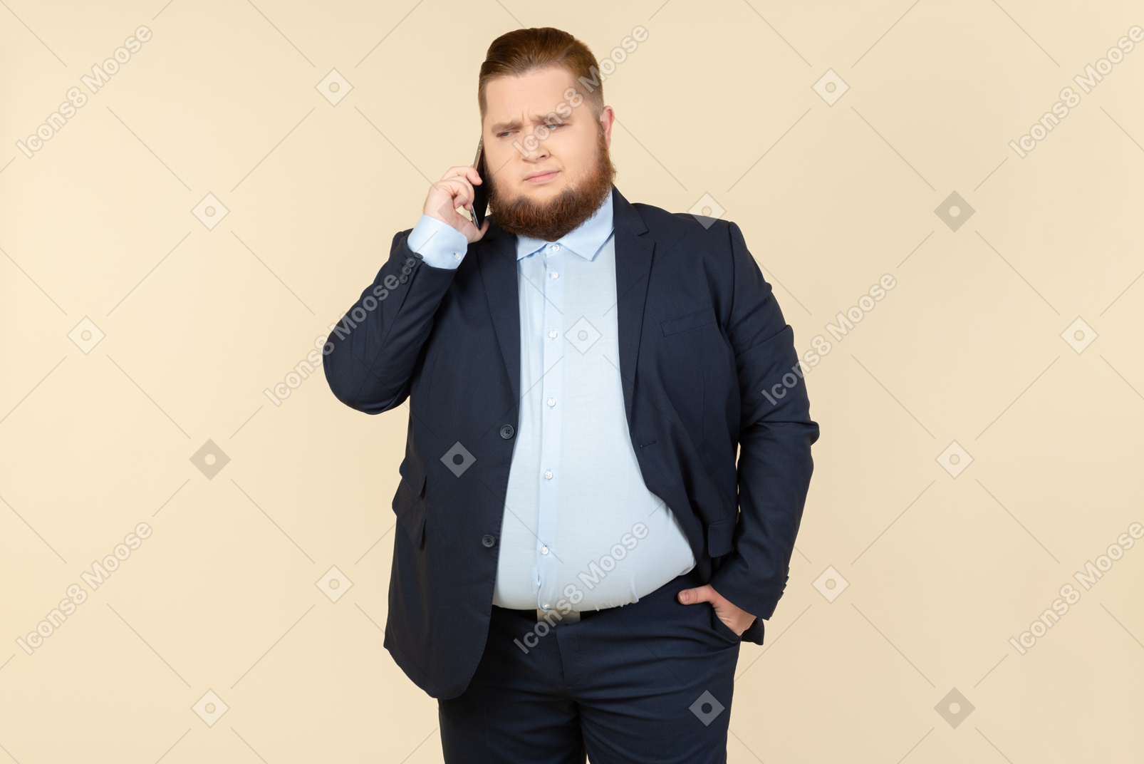 Sad looking young overweight office worker talking on the phone