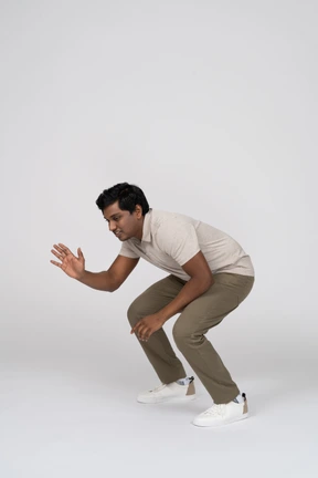Man in casual clothes posing