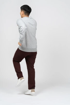 Man in casual clothes walking