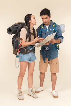 Young interracial couple having issues with road