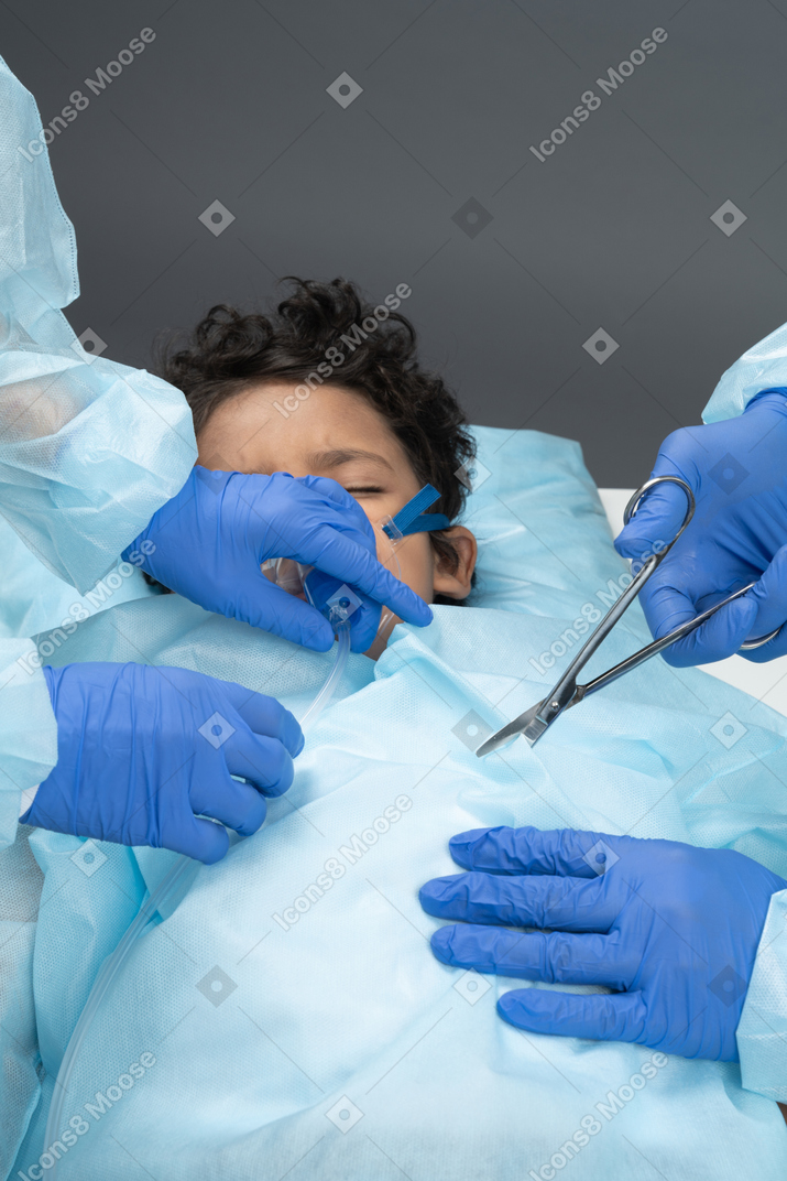 Doctor is operating on child