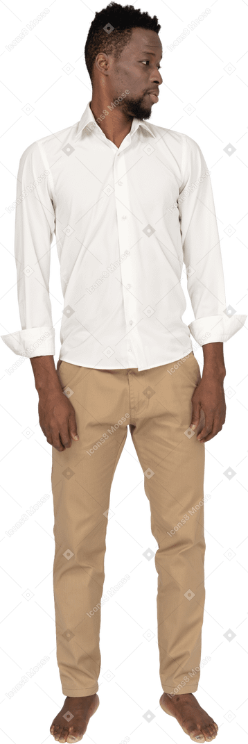 Man in white shirt standing