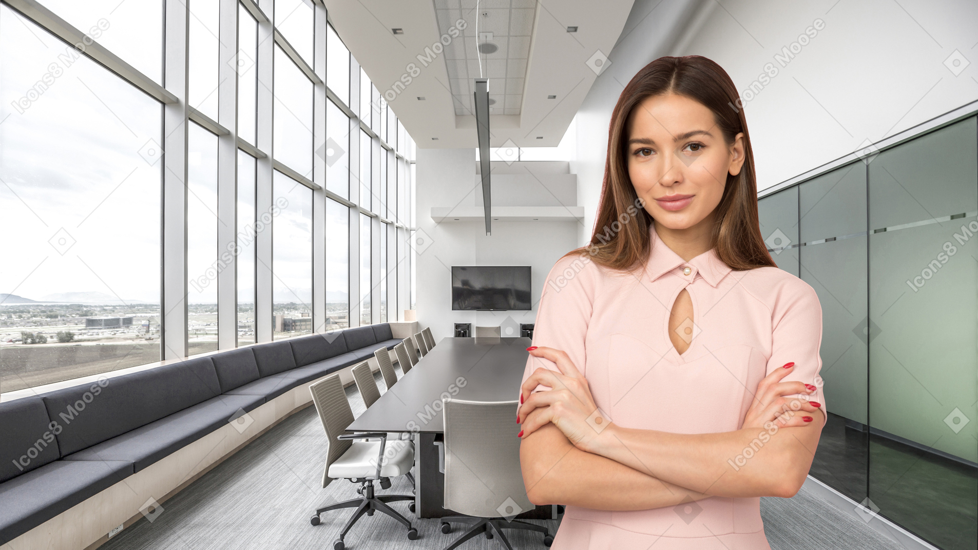 A business woman standing in front of a conference room