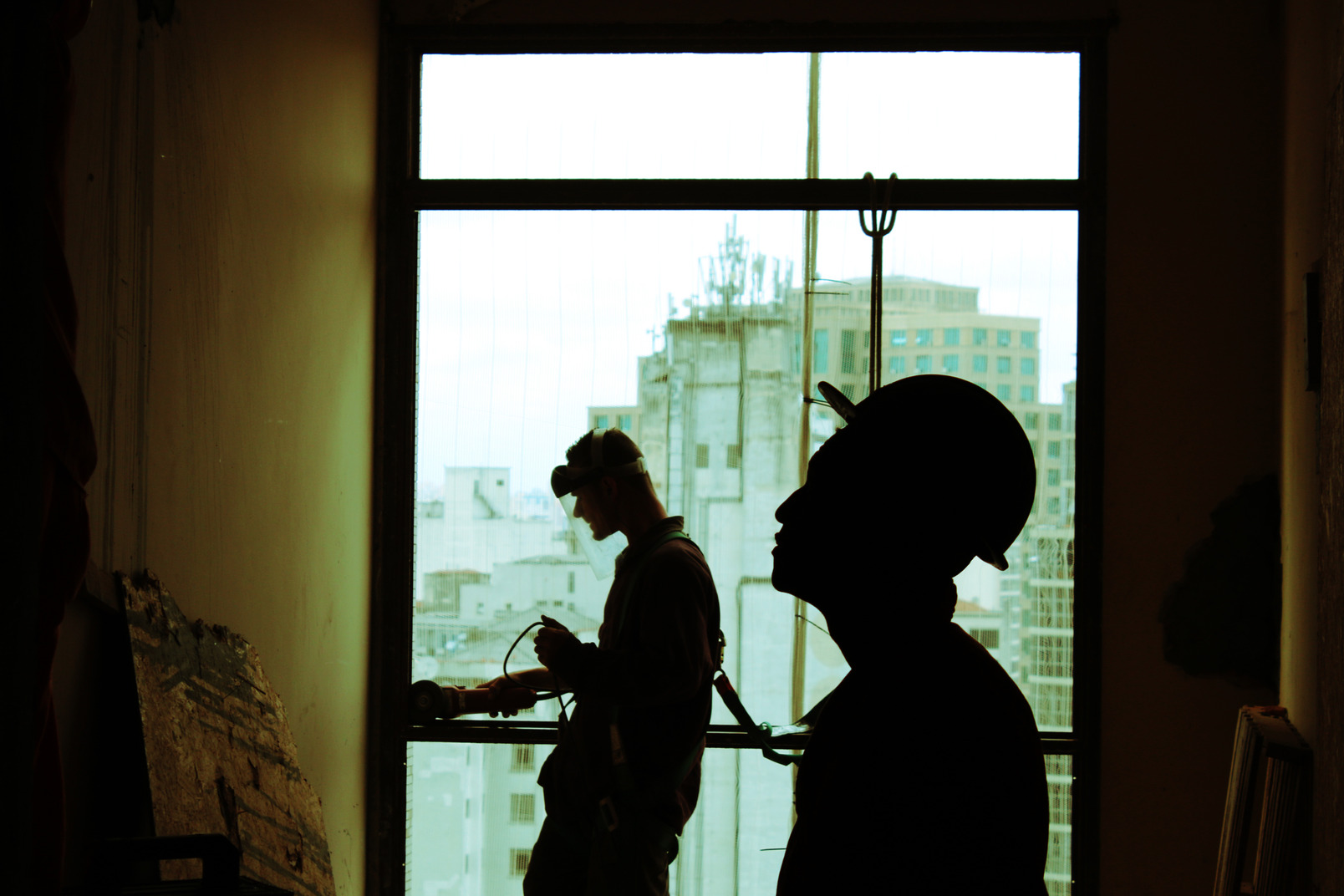 Two workers on a construction site