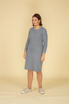 Front view of a woman in grey dress