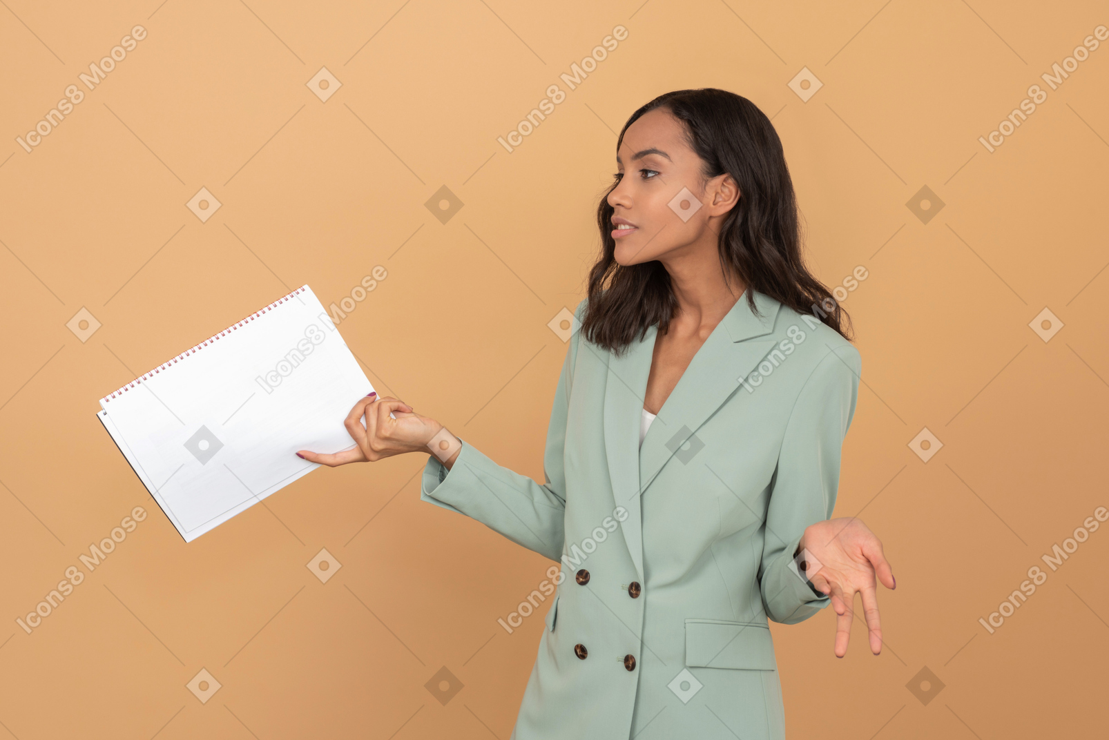 Attractive young office worker holding bunch of papers
