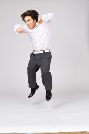 Happy young man jumping