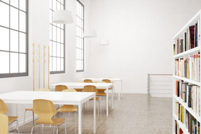 Library with bookcase, desks and chairs