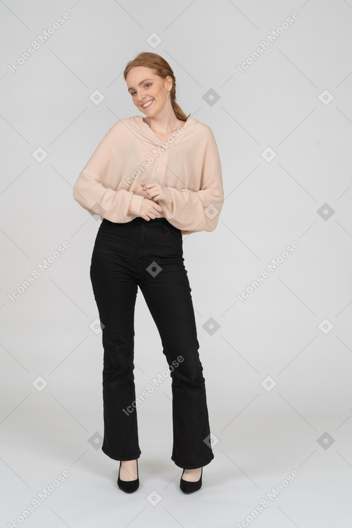 Woman in beautiful blouse standing