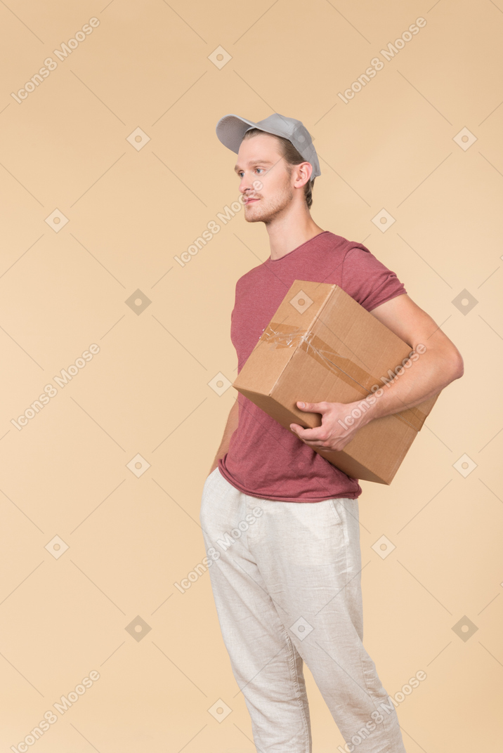 Delivery guy holding box