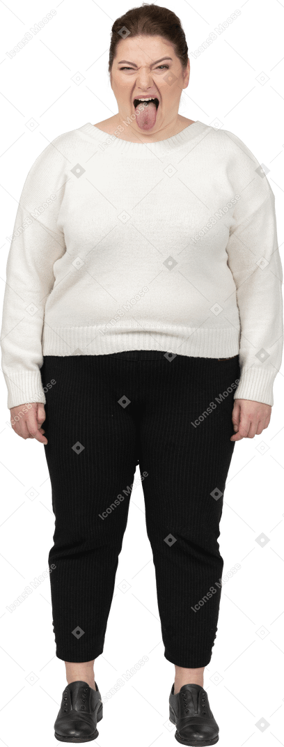 Angry plump woman in casual clothes looking at camera