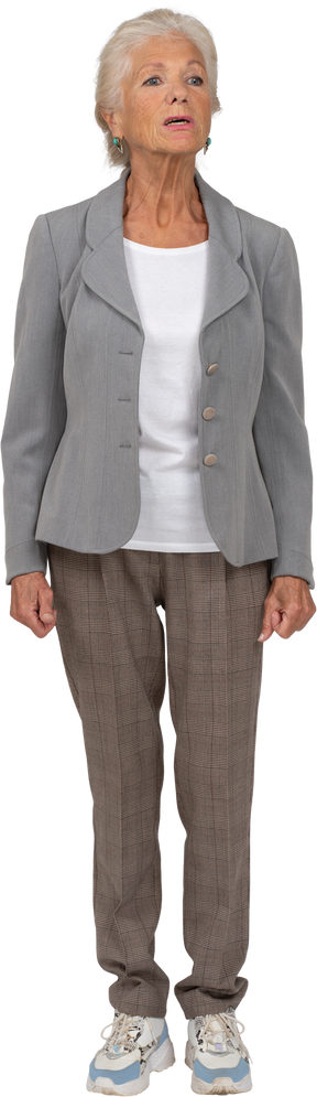 Front view of an old woman in suit saying something