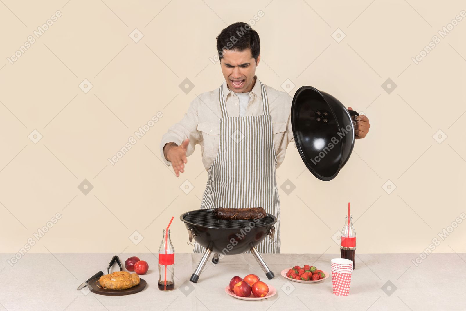 Troubled young man preparing bbq