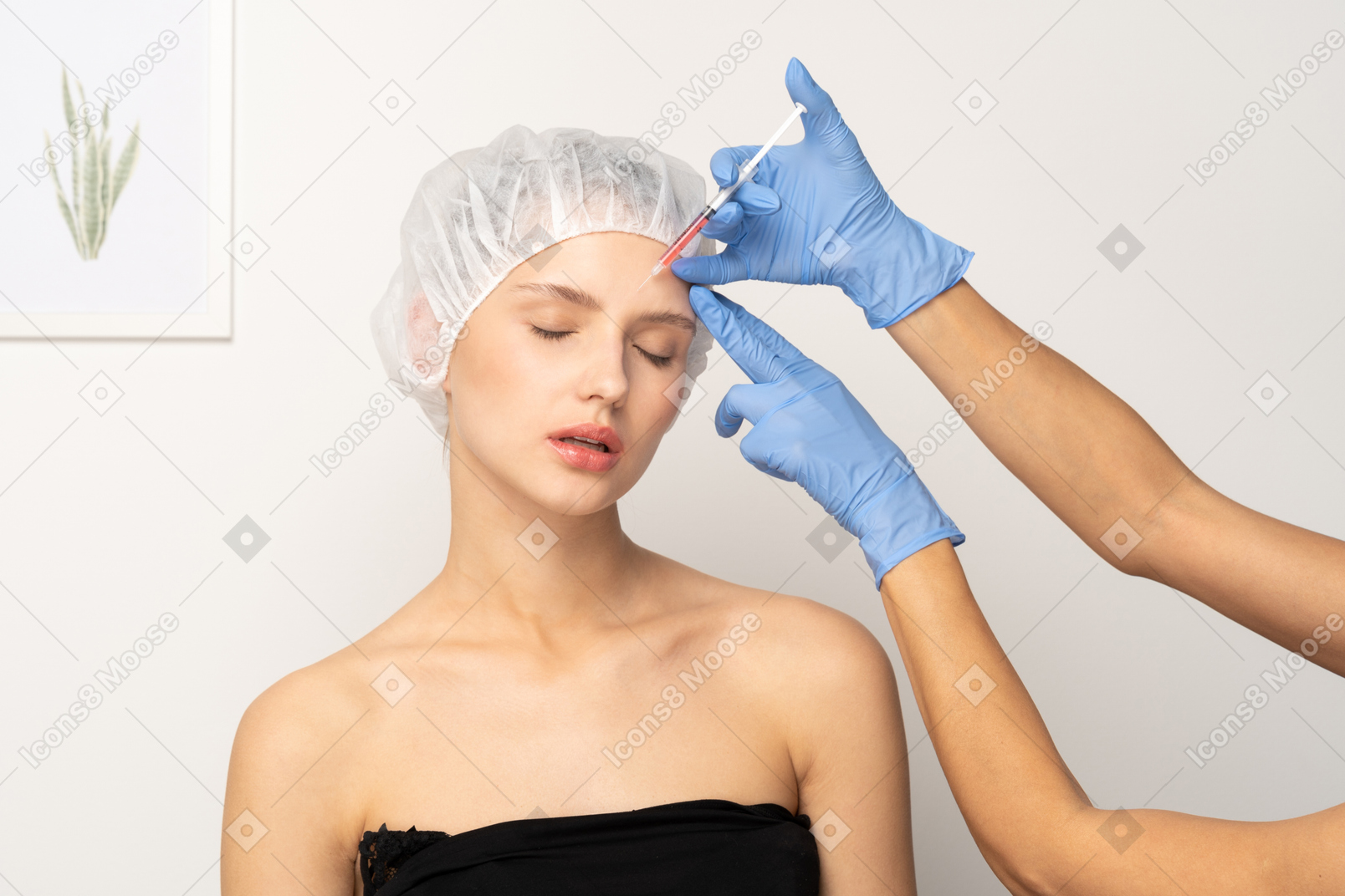 Young woman getting filler injection