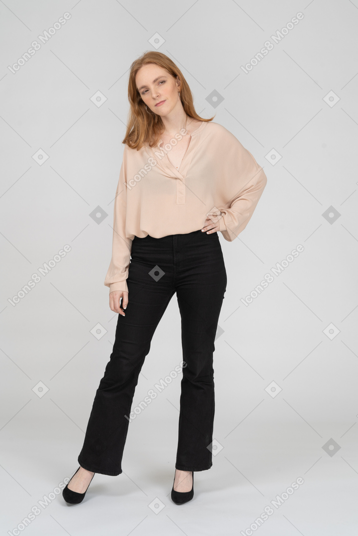 Woman in beautiful blouse standing