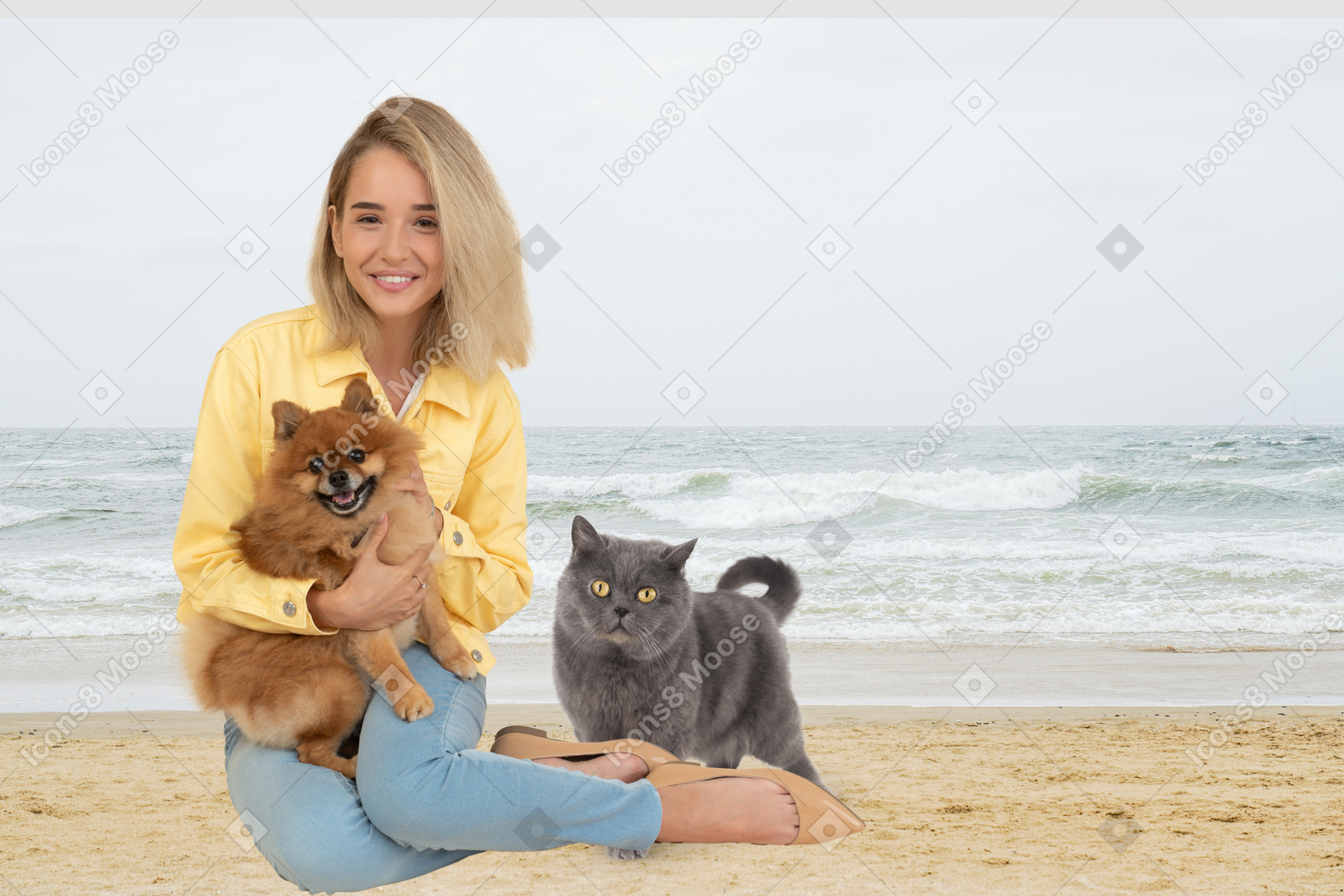 Mujer y sus mascotas pasando tiempo en la playa