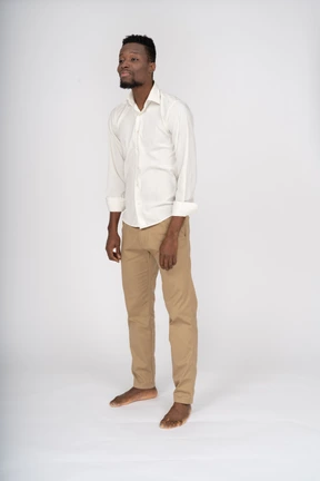 Man in white shirt standing