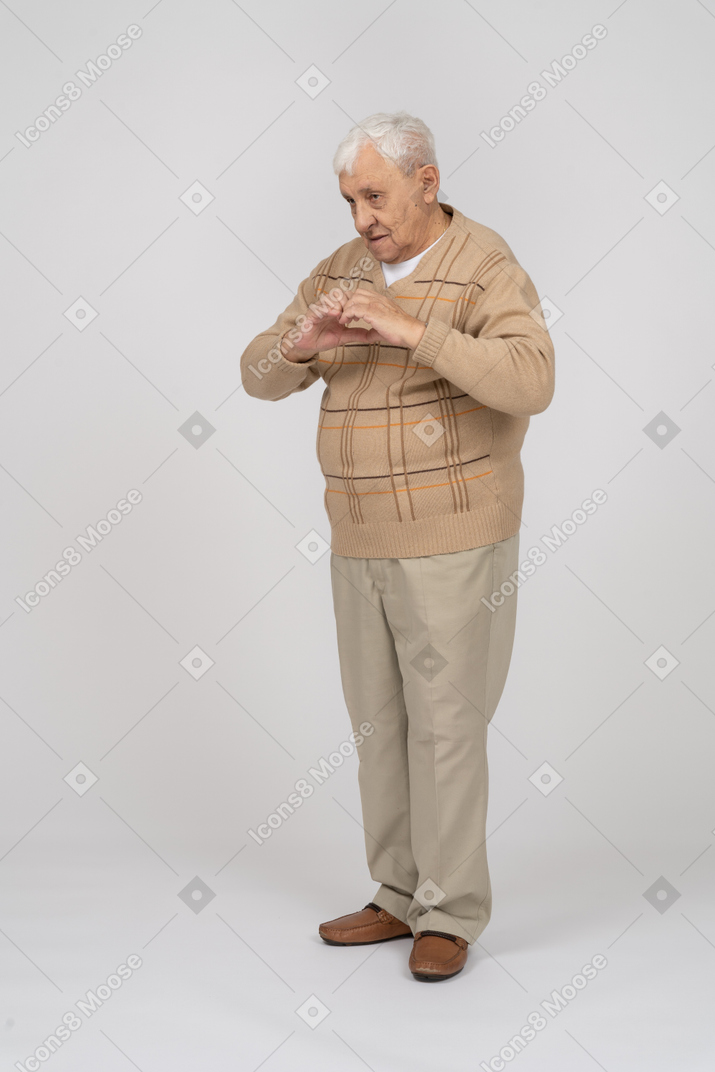 Front view of a thoughtful old man in casual clothes