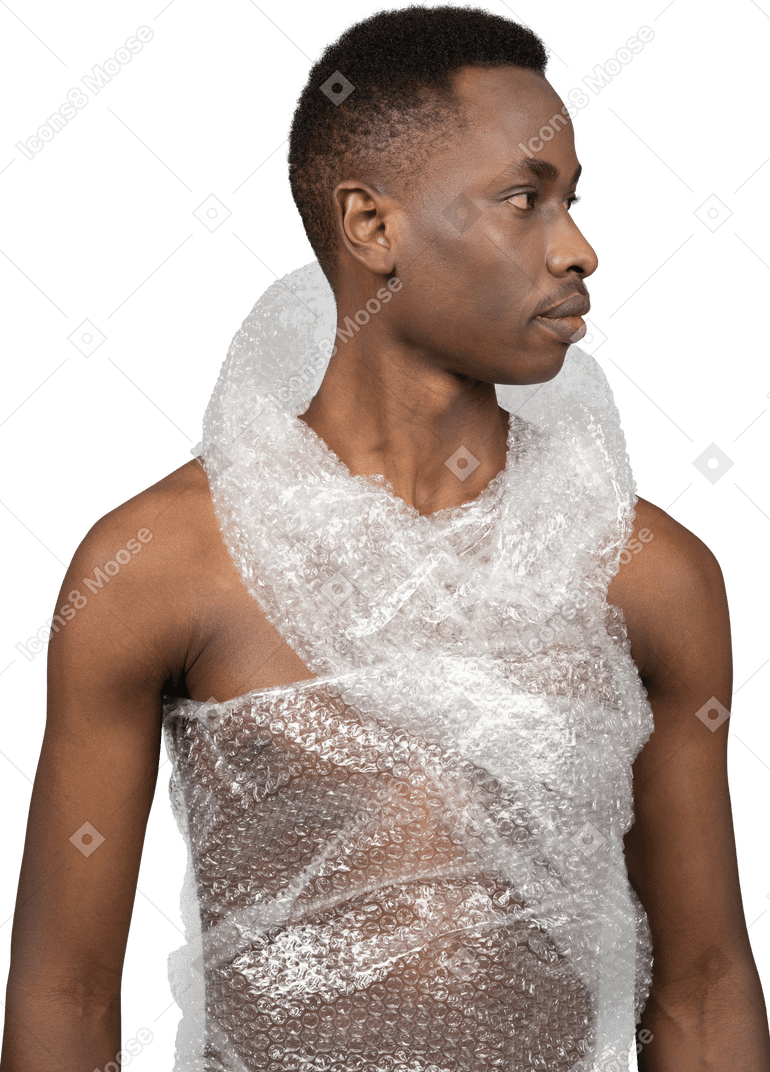 A portrait of a naked african young man wrapped in plastic