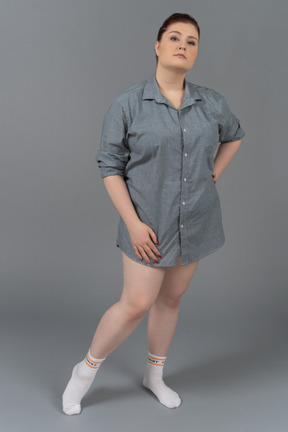 Body positive woman isolated over gray background