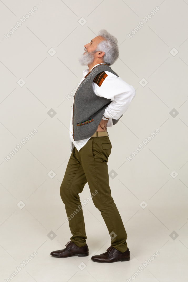 Side view of a man having back pain