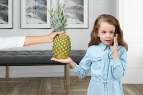 Girl with pineapple