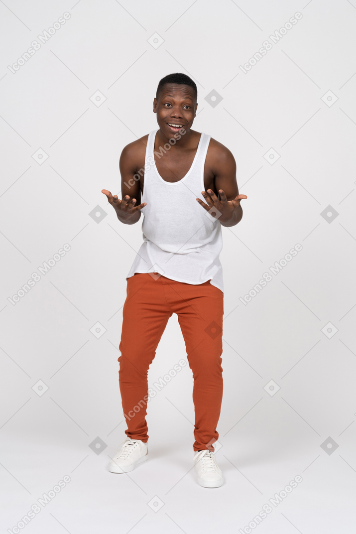 Front view of happy young man gesturing