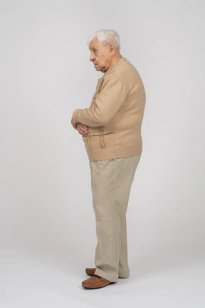 Side view of an old man in casual clothes
