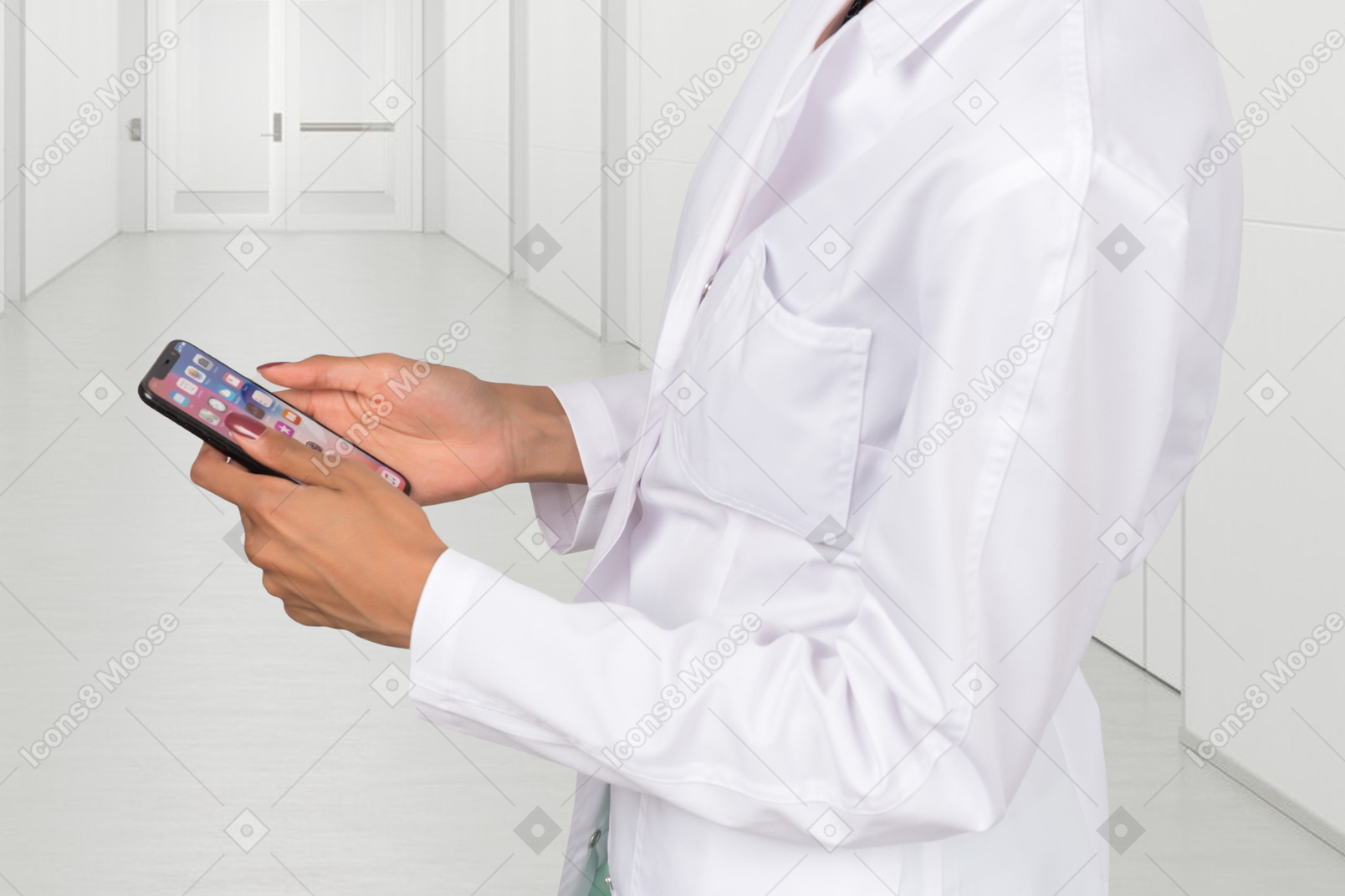 A woman in a white lab coat holding a cell phone