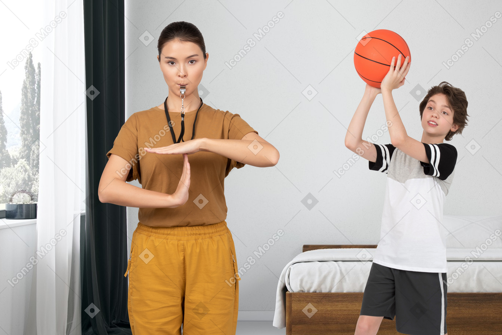 Man playing basketball with a boy